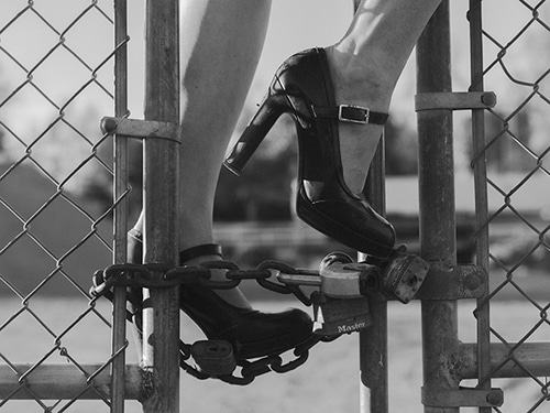 shoes on chain link