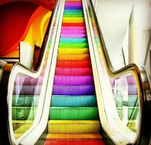 rainbow painted escalator steps