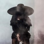 Beyonce in elegant black hat