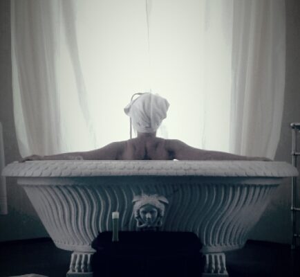 Woman in tub considering her life after divorce