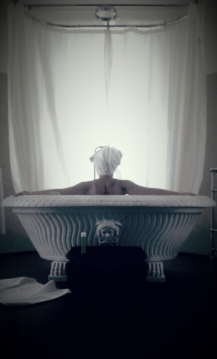 Woman in tub considering her life after divorce