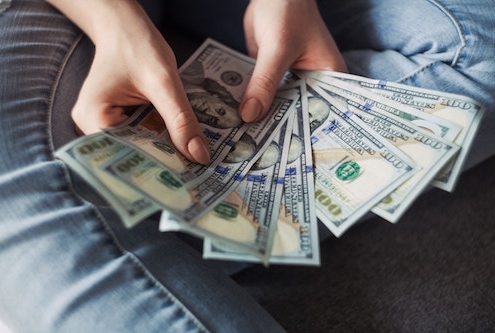 A woman thinking about asking for financial help with a divorce